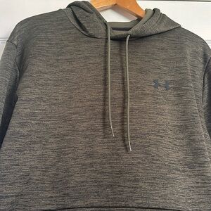 Lightly worn dark olive green pullover Under Armor jacket.